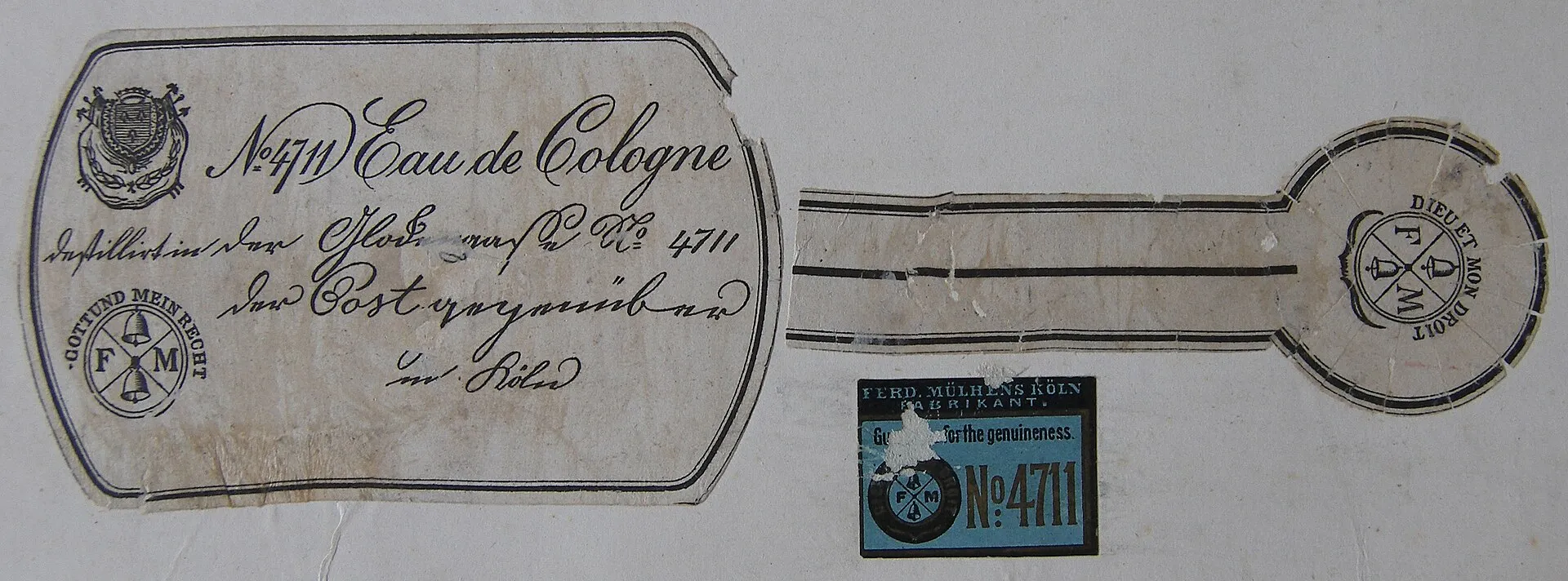 Etikett entworfen von Ferdinand Mülhens 1881 mit späteren Blau Gold Zusatzetikett.