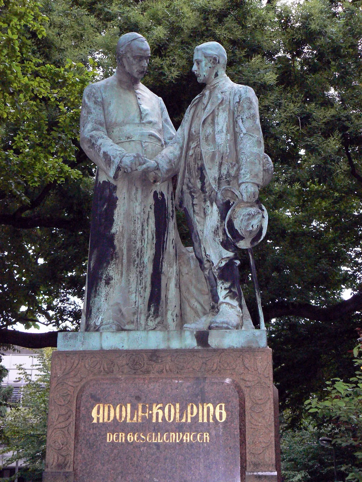 Skulptur Adolf Kolping - Der Gesellenvater in Köln, Sockelinschrift: J B Schreiner.