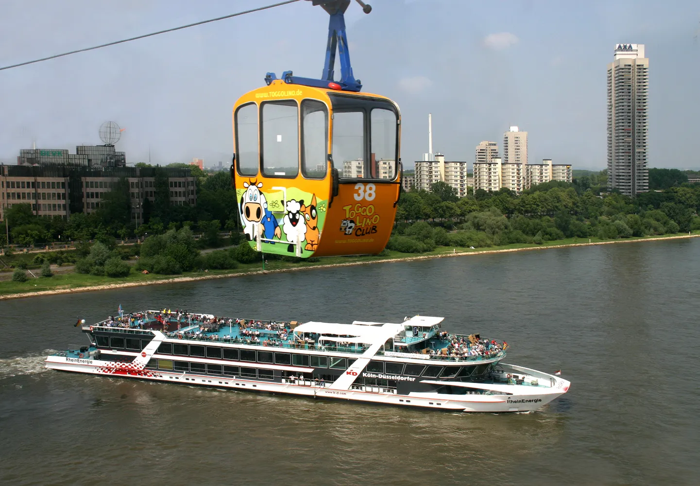 Cologne Rhein ropeway and Colonia building, Passenger ship MS RheinEnergie, company: Köln-Düsseldorfer