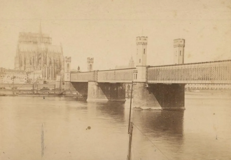 Cologne, Germany, Dombrücke with cathedral in the background. Photo by Theodor Johann Hubertus Creifelds, born 1839 in Coblenz, died 1902 in Cologne, albumen pr