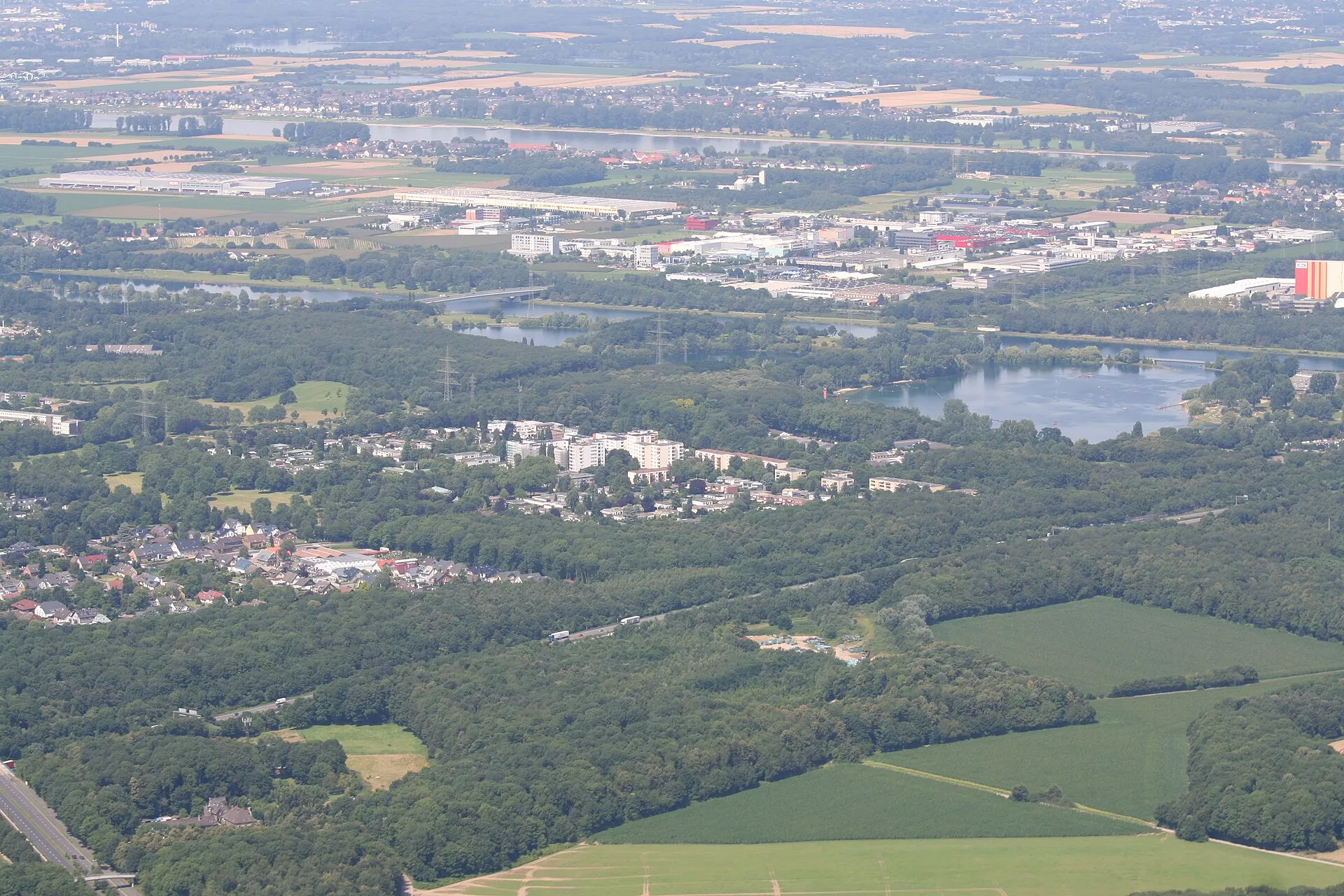 Cologne, suburb Seeberg, lake Fühlinger See, Commercial area Feldkassel. Aerial photography.