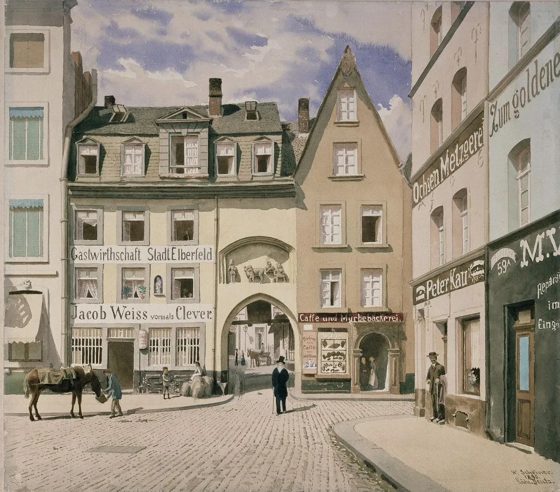 Köln-Heumarkt. Engangstor zur 1903 abgebrochenen Fleischhalle. Über dem Torbogen das Relief der Fleischmenger, im Nebenhaus das Gasthaus „Stadt Elberfeld“