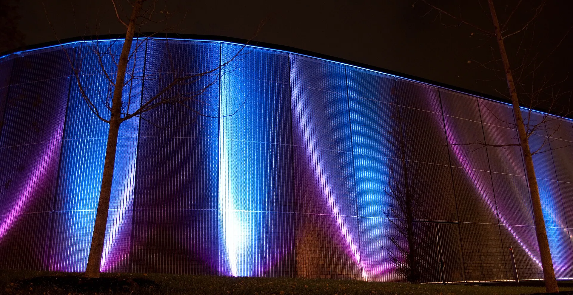 Facade of the Odysseum in Cologne at night