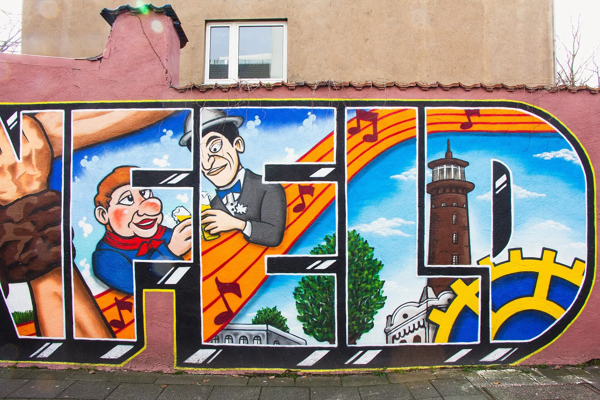 Wandgemälde Marienstraße in Köln-Ehrenfeld -- Tünnes und Schäl, Heliosturm. Künstler: Raik Herrling /www.spruehkopp.com